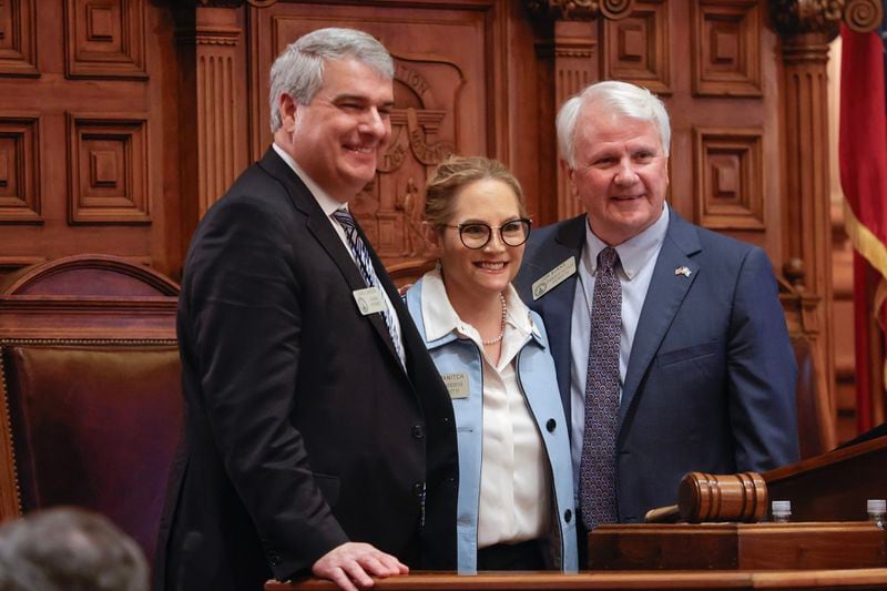 (Left to right) Republican state Rep. John Carson of Marietta, from left, Democratic state Rep. Esther Panitch of Sandy Springs and Georgia House Speaker Jon Burns gathered for a photo after the final passage of a bill making antisemitism part of the state's hate crimes law. (Natrice Miller/ Natrice.miller@ajc.com)