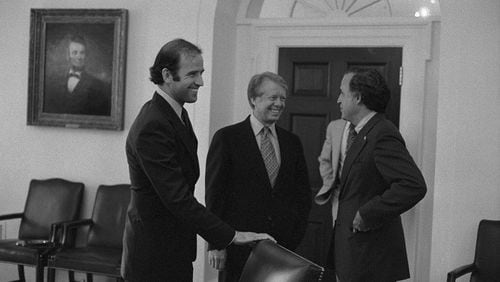 In this picture is from June 14, 1977, Sen. Joe Biden (left) with President Carter (center) and someone else from the Delaware delegation.
