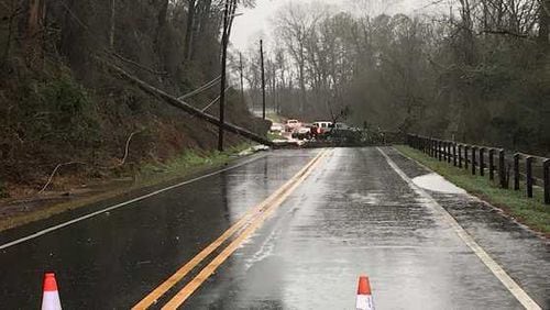 Azalea Road shut down from Ga. 9 to Willeo Road due to a tree across power lines and flooding, Roswell police said Thursday morning.