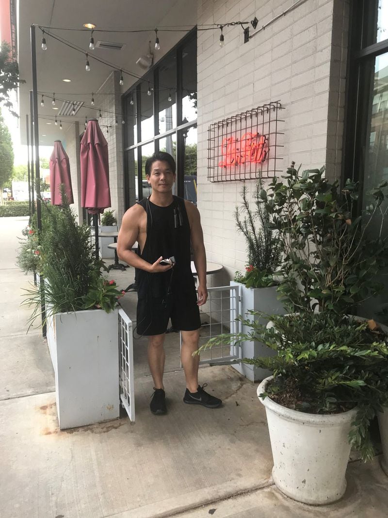 Guy Wong exercises regularly at a gym down the street from Le Fat, his restaurant in West Midtown. He’s lost 40 pounds. LIGAYA FIGUERAS / LFIGUERAS@AJC.COM