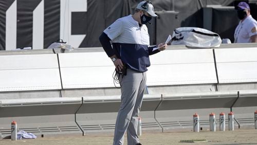 Titans offensive coordinator Arthur Smith works on the sidelines. Smith is the new Falcons head coach. (AP Photo/Phelan M. Ebenhack)
