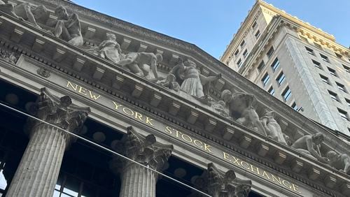The New York Stock Exchange is shown on Tuesday, May 21. The iconic trading center is owned by Atlanta-based Intercontinental Exchange, which has been fined $q10 million for keeping the NYSE from immediately reporting a cyber intrusion .  (AP Photo/Peter Morgan)