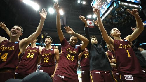 ATLANTA, GA - MARCH 22: The Loyola Ramblers celebrate after defeating the Nevada Wolf Pack during the 2018 NCAA Men's Basketball Tournament South Regional at Philips Arena on March 22, 2018 in Atlanta, Georgia. Loyola defeated Nevada 69-68. (Photo by Ronald Martinez/Getty Images)
