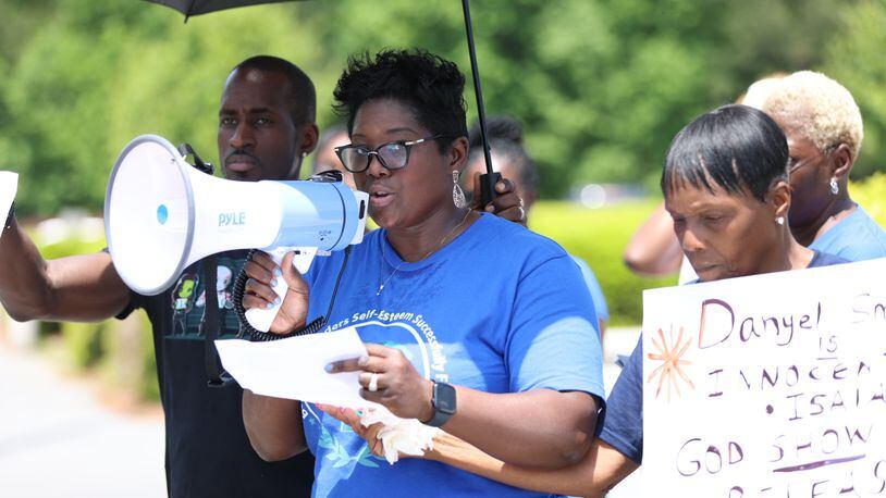 Latasha Pyatt, the fiance of Danyel Smith, gives a speech during the "Justice for Danyel Smith" rally outside the Gwinnett Justice Administration Center on Thursday, May 5th, 2022. Miguel Martinez /miguel.martinezjimenez@ajc.com