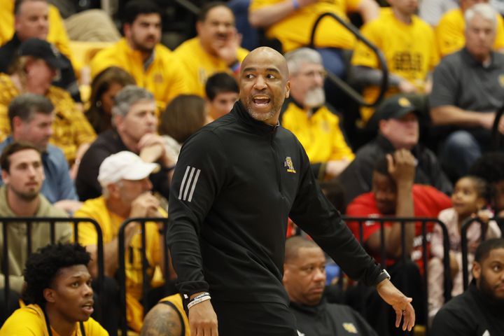 Kennesaw State Owls head coach Amir Abdur-Rahim reacts after a call during the second half against Liberty Flames at the Kennesaw State Convention Center on Thursday, Feb 16, 2023.
 Miguel Martinez / miguel.martinezjimenez@ajc.com