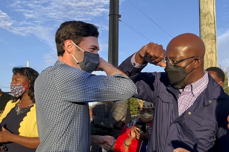 Georgia Democrats Jon Ossoff, left, and Raphael Warnock swept the state's U.S. Senate runoffs in races that saw nearly $1 billion in spending combined. (Jenny Jarvie/Los Angeles Times/TNS)