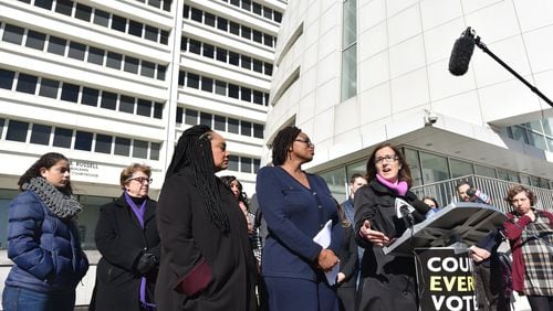 Lauren Groh-Wargo, CEO of Fair Fight and Abrams’ campaign manager, speaks to members of the press outside the Richard B. Russell Federal Building in Atlanta on Tuesday, November 27, 2018. HYOSUB SHIN / HSHIN@AJC.COM