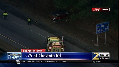 Police say a man driving a 2003 Acura lost control on I-75 north at the Chastain Road exit ramp. (Credit: Channel 2 Action News)