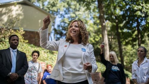 U.S. Rep. Lucy McBath could benefit from another round of redistricting if a federal judge rules in favor of plaintiffs challenging Georgia's Republican-drawn political maps.