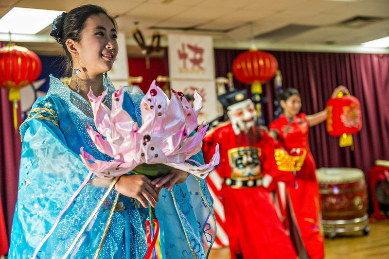 Ye Lu Yeu (left) performs on stage during the Atlanta Chinese Lunar New Year Festival in Chamblee on Saturday, February 13, 2016. Thousands of people came out to ring in the year of the monkey with food, performances and more. JONATHAN PHILLIPS / SPECIAL