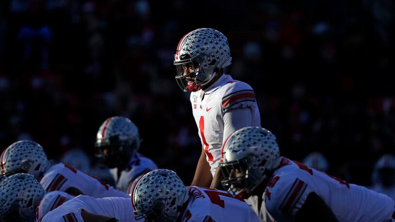 Ohio State quarterback Justin Fields (1) waits for the snap against Rutgers on Saturday, Nov. 16, 2019, in Piscataway, N.J. Ohio State won 56-21.