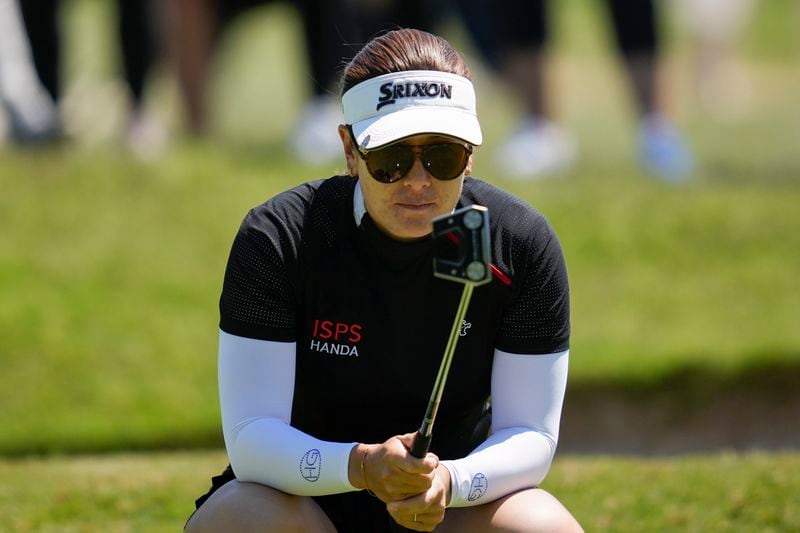 Hannah Green lines up a shot on the first green during the fourth round of the LPGA's JM Eagle LA Championship golf tournament at Wilshire Country Club, Sunday, April 28, 2024, in Los Angeles. (AP Photo/Ashley Landis)