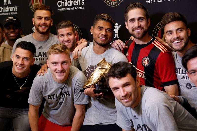 Photos from the press conference as Atlanta United forward Josef Martinez receives his Golden Boot trophy, given to the top MLS scorer each year, at the Atlanta United Training Facility in Marietta, Ga., on Thursday, Nov. 1, 2018. Atlanta Braves outfielder Ender Inciarte, a personal friend of Martinez, made a special guest appearance to give his friend the award. (Casey Sykes for The Atlanta Journal-Constitution)