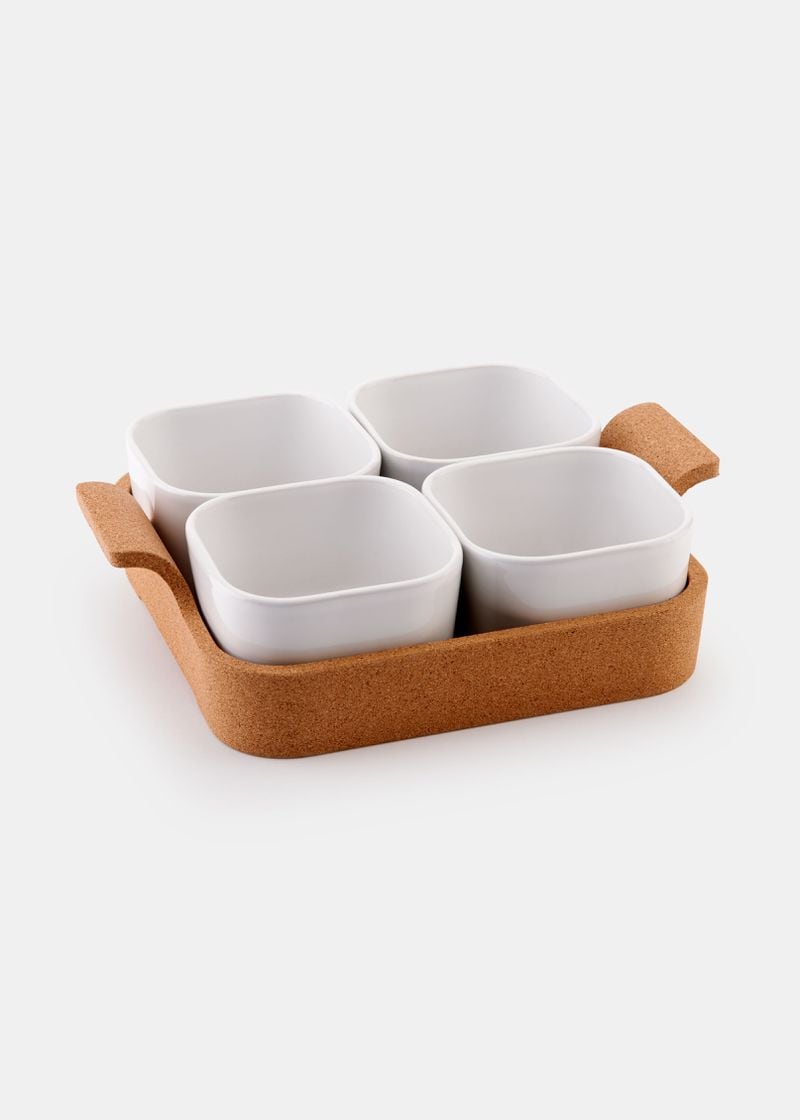 This cork tray holds four stoneware ramekins safe for use in the oven, freezer, microwave and dishwasher.