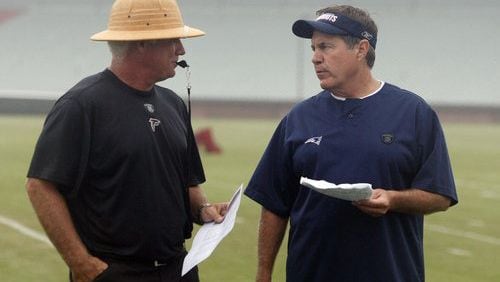 Bill Belichick (right) and former Falcons coach Mike Smith during a combined Patriots-Falcons practice in Flowery Branch before the 2010 NFL season. (Photo by Curtis Compton/AJC file)