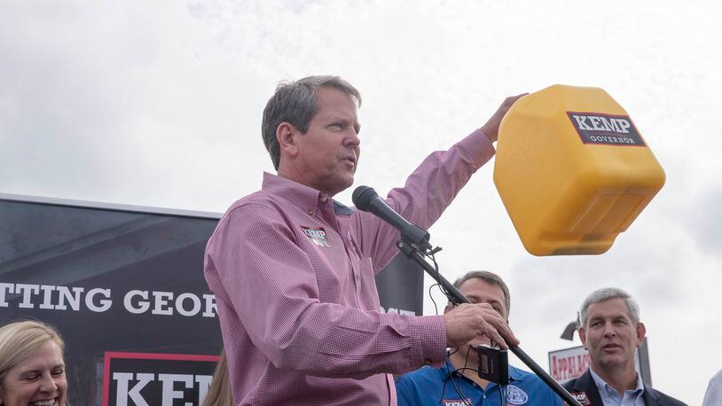 10/01/2018 -- Jasper, Georgia -- Georgia Republican Gubernatorial candidate Brian Kemp encourages his supporters to donate funds to his campaign by filling up a diesel gas can during a stop at Appalachian Gun, Pawn &Range in Jasper, Monday, October 1, 2018. Monday was the first day of Brian Kemp's weeklong bus tour where he and his campaign will visit 27 counties in 5 days. (ALYSSA POINTER/ALYSSA.POINTER@AJC.COM)