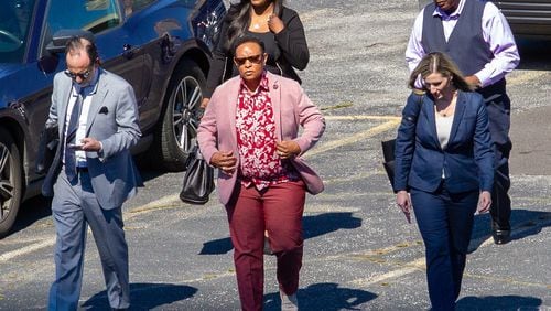 Mitzi Bickers (C) heads towards the Atlanta Federal Courthouse Thursday, March 3, 2022  STEVE SCHAEFER FOR THE ATLANTA JOURNAL-CONSTITUTION