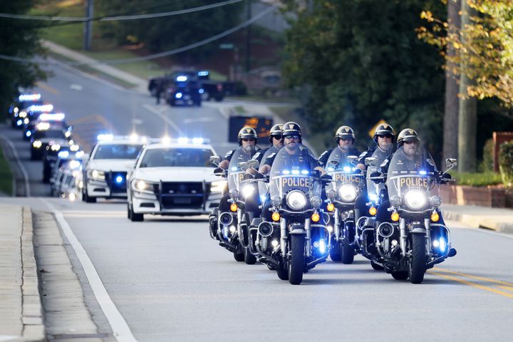 A motorcade leads the caravan where the hearse of the fallen Deputy Jonathan Koleski is being transported to the NorthStar church for his funeral service on Wednesday, September 14, 2022. Wednesday, September 14, 2022. Miguel Martinez / miguel.martinezjimenez@ajc.com