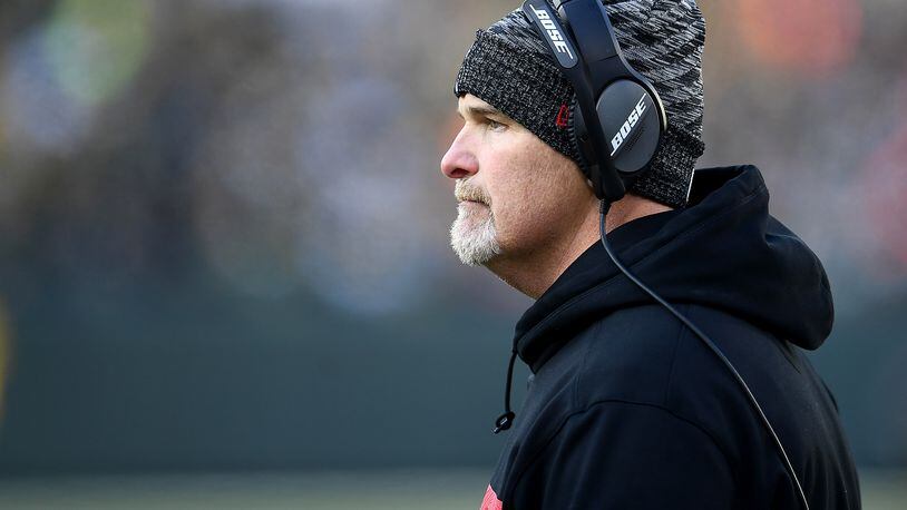 GREEN BAY, WISCONSIN - DECEMBER 09: Head coach Dan Quinn of the Atlanta Falcons watches from the sideline during the second half of a game against the Green Bay Packers at Lambeau Field on December 09, 2018 in Green Bay, Wisconsin. (Photo by Stacy Revere/Getty Images)