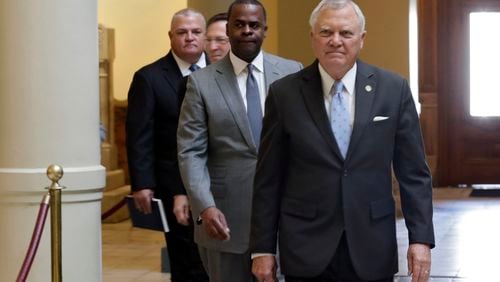 October 26, 2016 - Atlanta - Gov. Nathan Deal leads Atlanta Mayor Kasim Reed and Anthem company leaders from his office to make the announcement. BOB ANDRES /BANDRES@AJC.COM