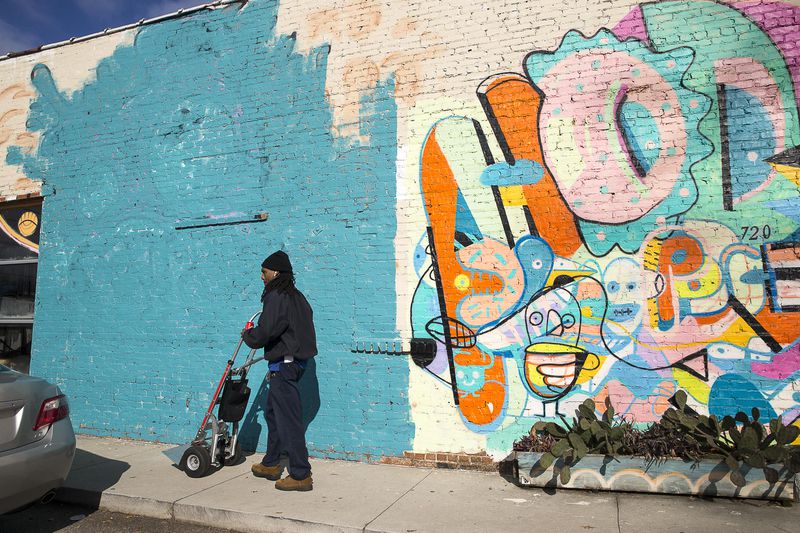 01/15/2019 -- Atlanta, Georgia -- A mural by Atlanta-based artist Ray Geier has been painted over with blue paint at HodgePodge Coffeehouse and Gallery in the East Atlanta community of Atlanta, Tuesday, January 15, 2019. (ALYSSA POINTER/ALYSSA.POINTER@AJC.COM)