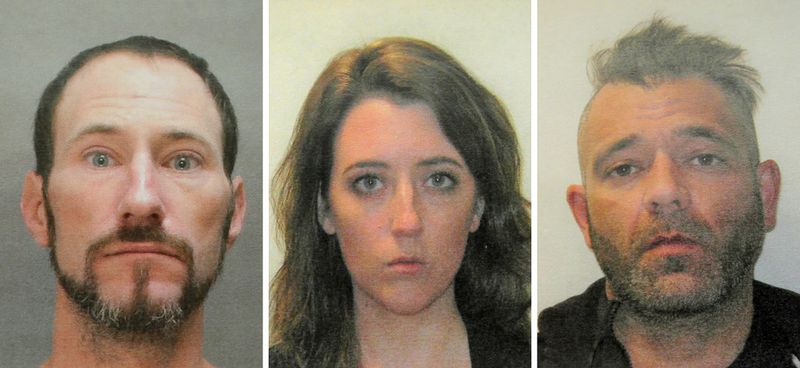 FILE - This November 2018 file combination of photos provided by the Burlington County Prosecutors office shows Johnny Bobbitt, left, Katelyn McClure and Mark D'Amico. On Tuesday, Dec. 25, 2018, GoFundMe says it has made refunds to everyone who contributed to a campaign involving homeless veteran Bobbitt who prosecutors allege schemed with a New Jersey couple, McClure and D'Amico, to scam donors out of $400,000.
