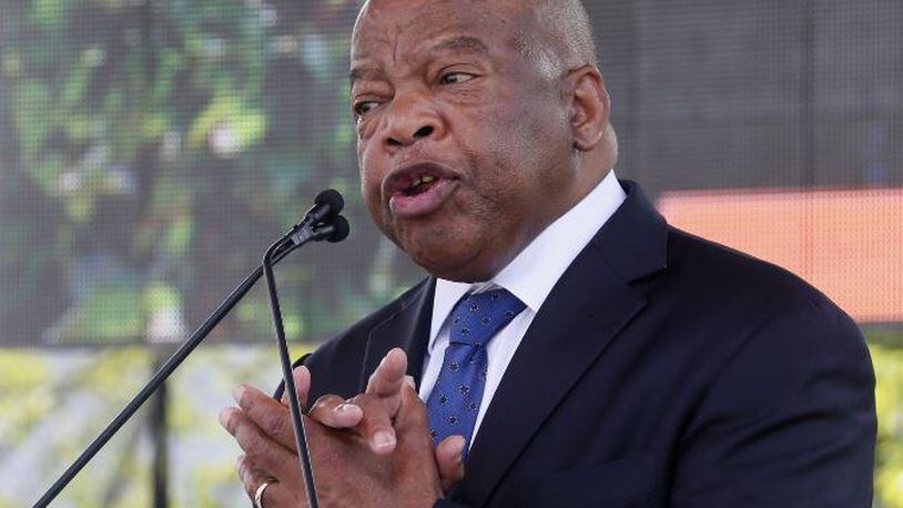 U.S. Rep. John Lewis, D-Atlanta, at the 2014 opening of the National Center for Civil and Human Rights in Atlanta. Bob Andres, bandres@ajc.com