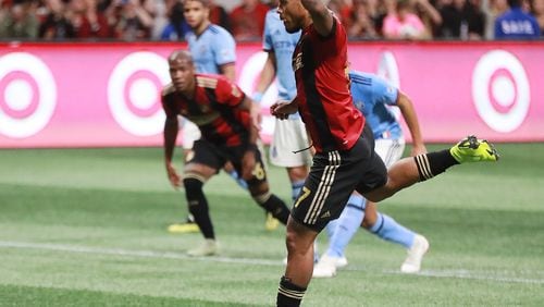 Atlanta United Josef Martinez scores the team’s first goal on a penalty kick for a 1-0 lead over New York City during the first half in their MLS Eastern Conference Semifinal playoff match on Sunday, Nov. 11, 2018, in Atlanta.  Curtis Compton/ccompton@ajc.com