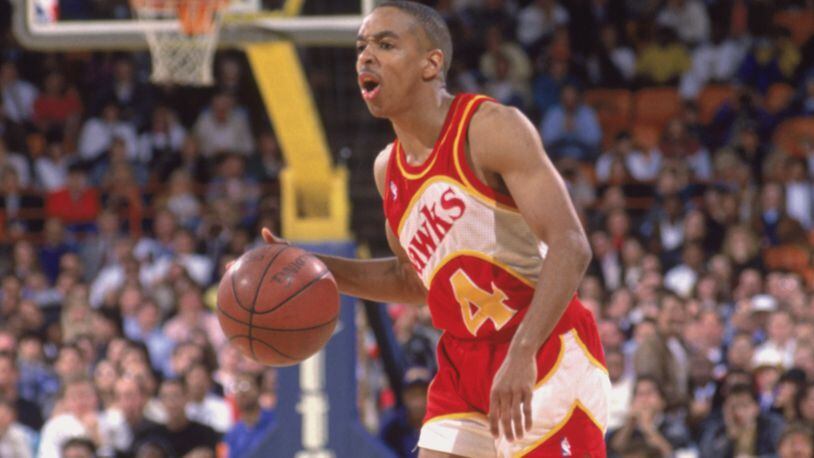 Hawks' Spud Webb dribbles the ball against the Los Angeles Lakers in 1989 at the Great Western Forum in Inglewood, Calif.