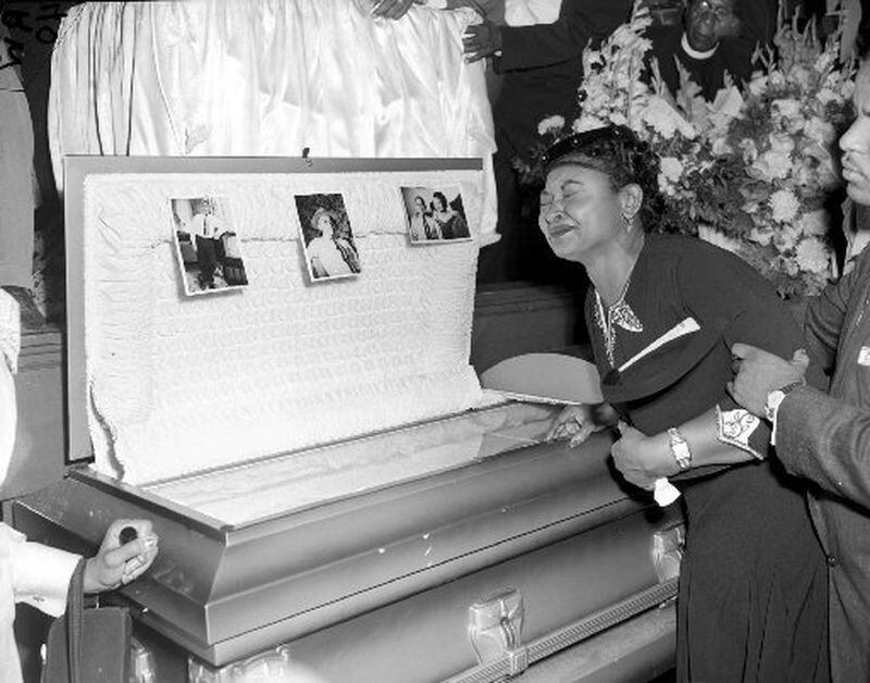 In this Sept. 6, 1955, photo, Mamie Till Mobley weeps at her son’s funeral in Chicago. Emmett Till was so badly beaten that his body was not recognizable. But his mother insisted on an open casket so the world could see the horrors of racism. (AP Photo/Chicago Sun-Times)
