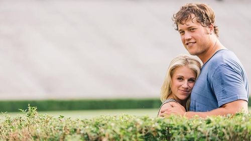 Former UGA quarterback Matt Stafford and wife Kelly Stafford, here posing in their engagement photo shoot at Sanford Stadium, have donated $350,000 to a diversity and social justice initiative launched by UGA on Friday.