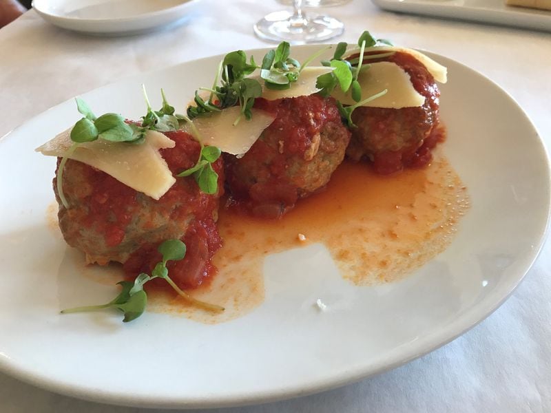 An appetizer of meatballs with marinara and shaved Parmesan at						Montaluce Winery would go well with its rose or pinot noir. LIGAYA						FIGUERAS / LFIGUERAS@AJC.COM