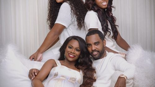 Kandi Burruss with her family: Riley Burruss, Kaela Tucker and Todd Tucker. CONTRIBUTED BY DREXINA NELSON PHOTOGRAPHY