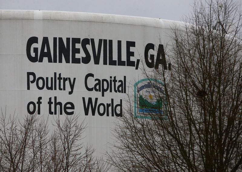 A water tank touts Gainesville as the poultry capital of the world. Curtis Compton / ccompton@ajc.com
