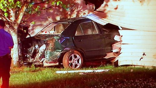 A car plowed into a Charlotte residence late Thursday.