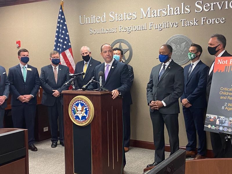 Georgia Attorney General Chris Carr speaks to reporters Thursday. A recent operation led by the U.S. Marshals Service resulted in the recovery of 39 missing children, including 15 who were the victims of sex trafficking, officials said.