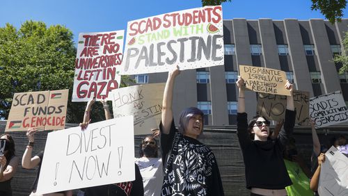 SCAD students hold a walkout for Palestine in front of SCAD on Peachtree Street, Wednesday, May 1, 2024, in Atlanta. SCAD students walked-out of classes in solidarity with Columbia and other university students across the U.S. in support of an immediate cease-fire.  (Jason Getz / AJC)
