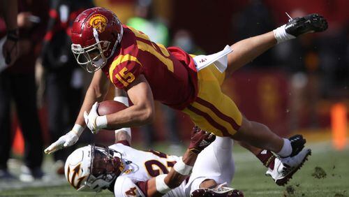 Drake London #15 of the USC Trojans collides with Chase Lucas #24 of the Arizona State Sun Devils during the first half of a game at Los Angeles Coliseum on November 07, 2020 in Los Angeles, California. (Photo by Sean M. Haffey/Getty Images/TNS)