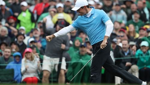 April 7, 2018 - Augusta, Ga: Rory McIlroy celebrates his birdie putt on the eighteenth hole during the third round of the Masters Tournament Saturday, April 7, 2018, at Augusta National Golf Club. PHOTO / JASON GETZ