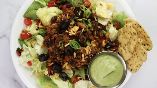 Perfectly Portioned Nutrition’s Turkey Taco Salad with Avocado Crema. (Courtesy of Kay Social)