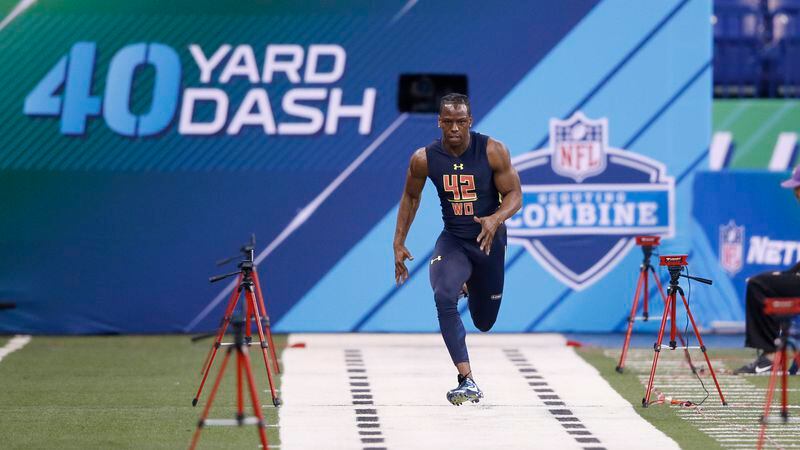 Wide receiver John Ross of Washington runs the 40-yard dash during the NFL Combine at Lucas Oil Stadium on March 4, 2017 in Indianapolis.