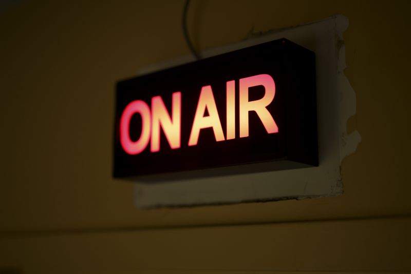The “On Air,” light is shown outside of the WCLK radio studio at their station on the lower level of the Woodruff Library on Clark Atlanta’s campus, Thursday, January 25, 2024, in Atlanta. WCLK is celebrating the 50th anniversary of Atlanta's jazz station. (Jason Getz / jason.getz@ajc.com)