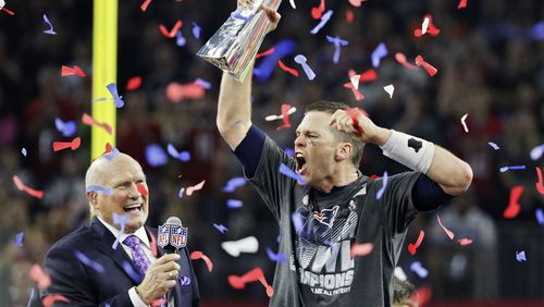 Here's a scene Pats fans never want you to forget: Tom Brady celebrating his historic Super Bowl comeback victory over the Falcons. (Bob Andres/AJC)