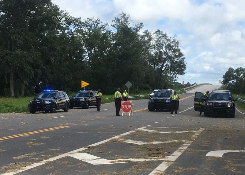 The bridge to Tybee Island is blocked at the Bull River until further notice. An officer standing guard said he didn't have any information regarding when people would be able to come or go. Photo: Jennifer Brett, jbrett@ajc.com