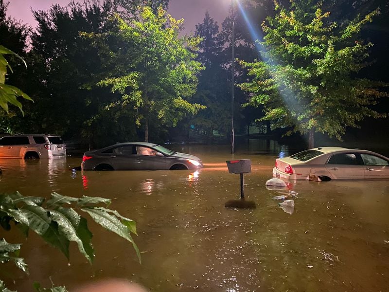 Atlanta fire officials said they responded to more than a dozen calls of cars submerged in water.