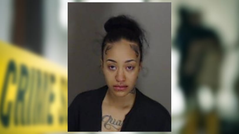 Quaneesha Johnson is charged with murder in a Sunday morning fatal shooting in DeKalb County, police said.