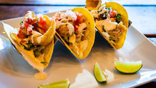 The Tomahawk Tacos at Catfish Hox were named best seafood dish at Taste of Marietta for two years in a row. CONTRIBUTED BY HENRI HOLLIS