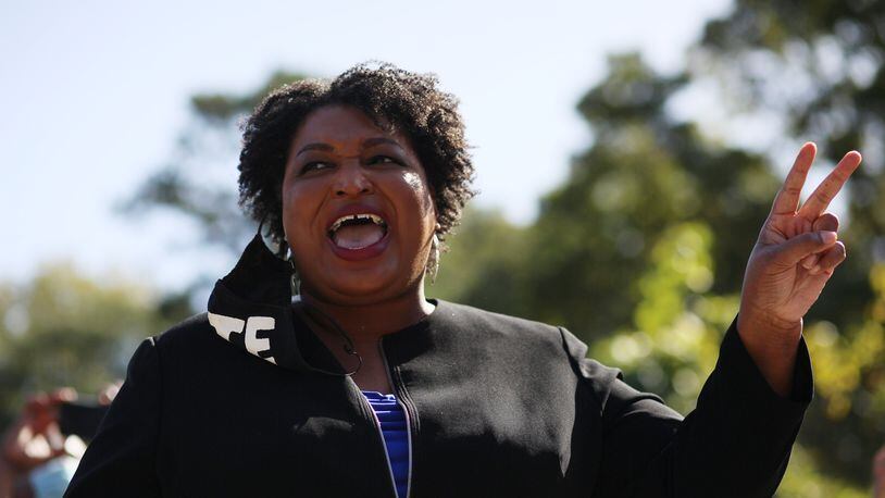 Former Georgia Minority Leader Stacey Abrams speaks to dozens of Raphael Warnock supporters during Election Day; the democratic candidate try to flip the State Senate to a democratic side on Tuesday, Nov. 3, 2020, Miguel Martinez for The Atlanta Journal-Constitution