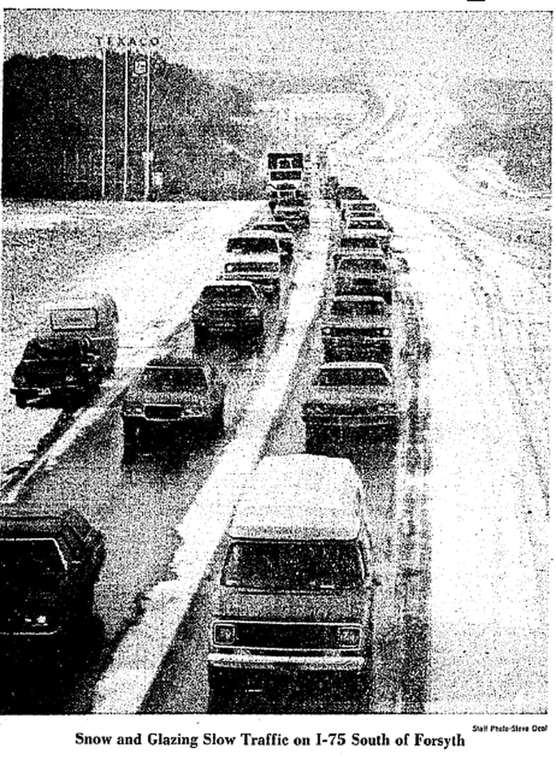A staff photo from a Jan. 19, 1977, edition of The Atlanta Constitution showing snow and traffic on I-75 south in Forsyth County.