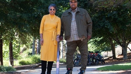 Hattie Whitehead and Bobby Crook stand on a pathway in the area of the University of Georgia campus that was once the Linnentown neighborhood on Monday, Oct 18, 2021. 
(Sarah White for the Atlanta Journal-Constitution)